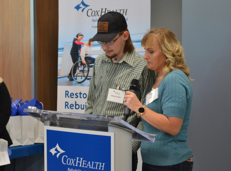 Steven and his mother speaking.
