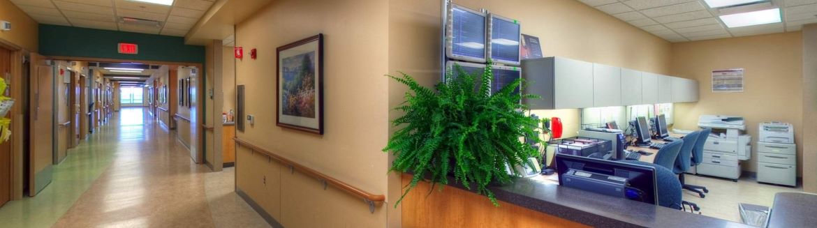 A view of Select Specialty Hospital Ann Arbor nursing station and hallway.