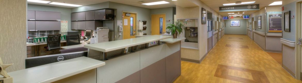 The nursing station and hospital hallway of Select Specialty Hospital Saginaw.