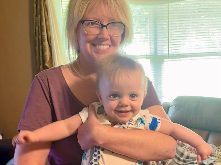 Crystal with her son.