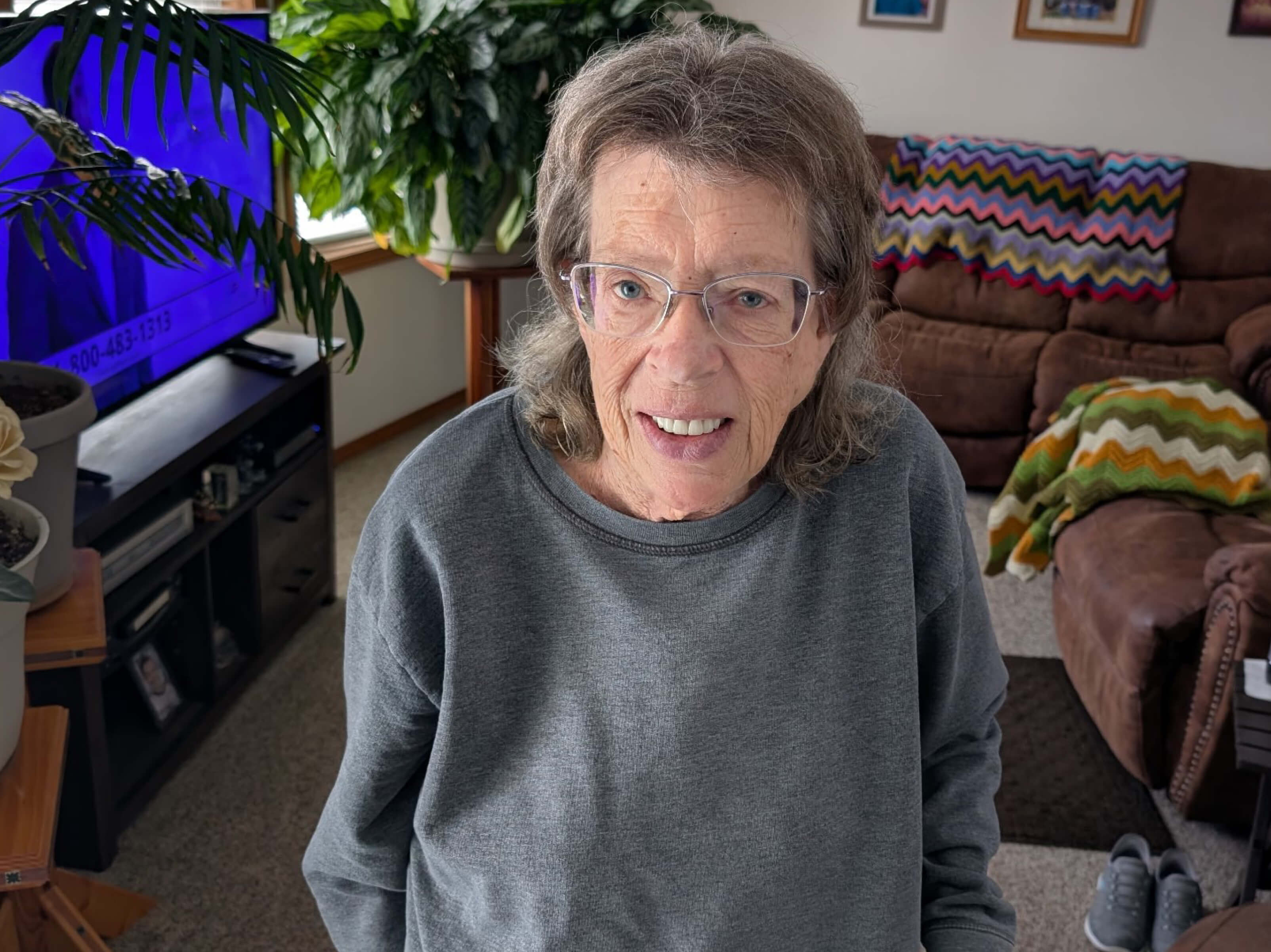 Debra smiling at the camera.