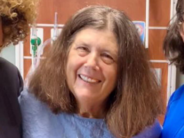 Julie smiling for the camera.