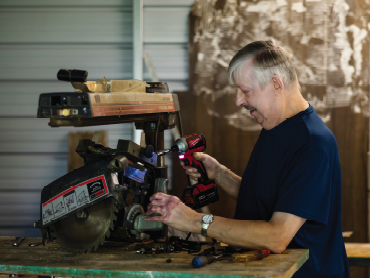Keith working in his woodshop.