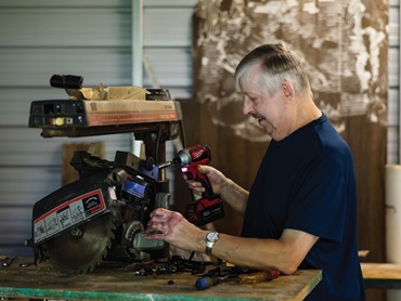 Keith working in his woodshop.