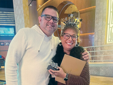 Stacy Bortel and her husband hug as they celebrate her birthday.
