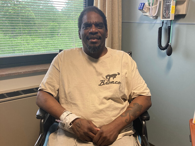 Torrene Anderson smiles in his new wheelchair at the hospital.